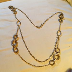 Silver layered necklace with chain link rings.
